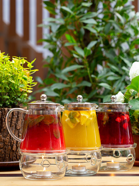 Tea Service for Spring & Summer Events Colorful herbal teas with garnish can dazzle a beverage service!